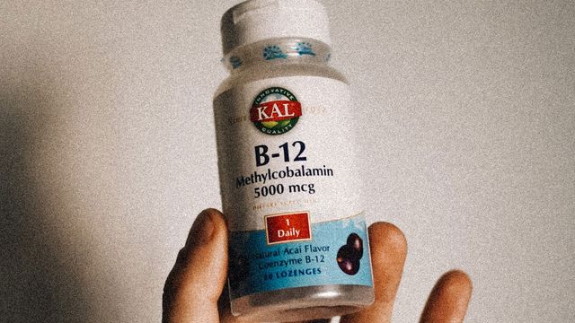 A bottle of B12 supplement tablets. 